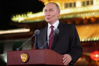 Russian president Vladimir Putin speaks during a press conference at the end of his visit to China for the Tianjin SCO Summit in Beijing